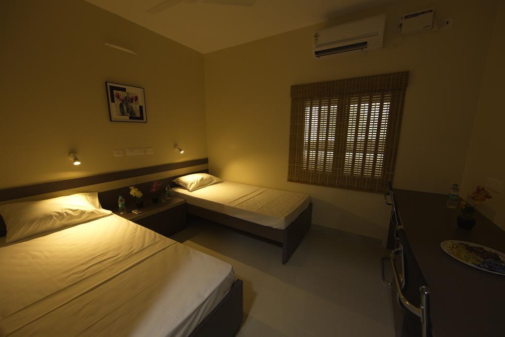 Pearl Guest House Chennai Værelse billede